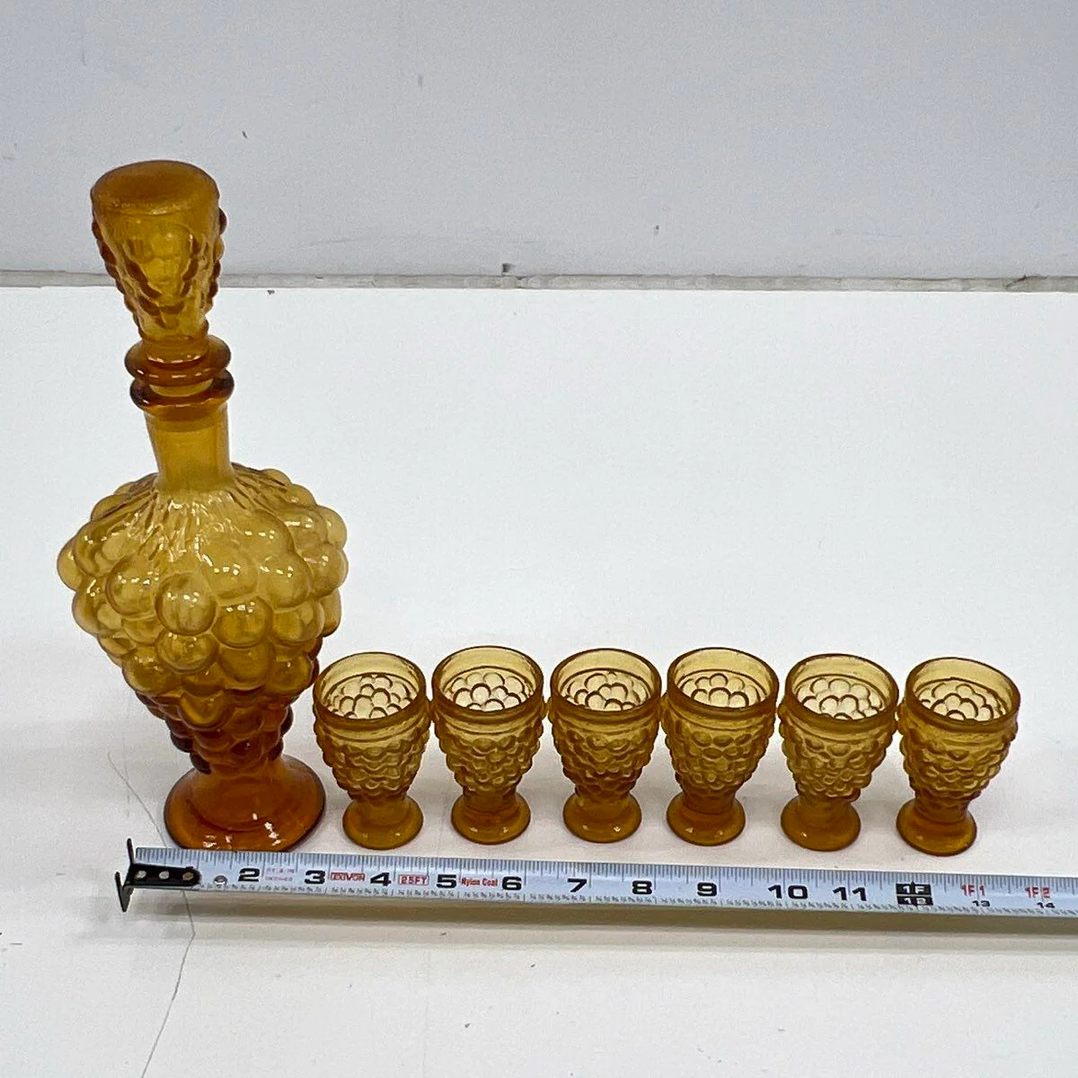 Pressed Glass Grape Harvest 7 Piece Decanter Set Amber 6 Footed Glasses Vintage - Image 3