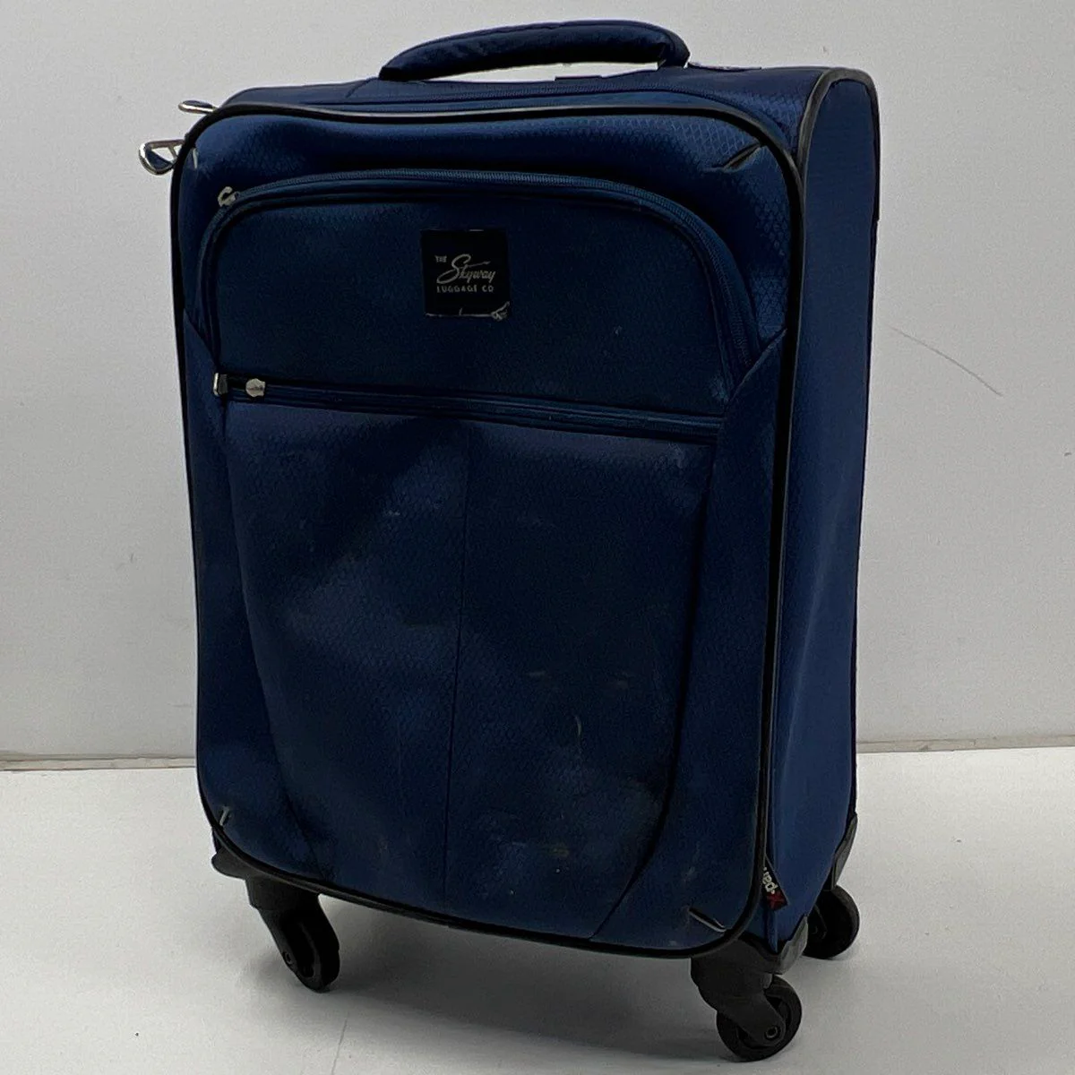 Skyway Navy Blue Fabric 4-Wheel Spinner Suitcase Travel Luggage Carry-On